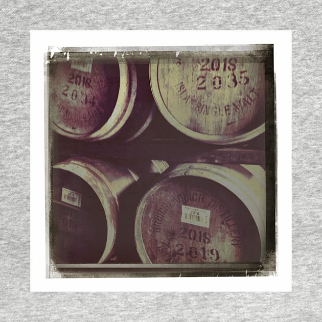 Whisky Casks stored in a warehouse by richflintphoto